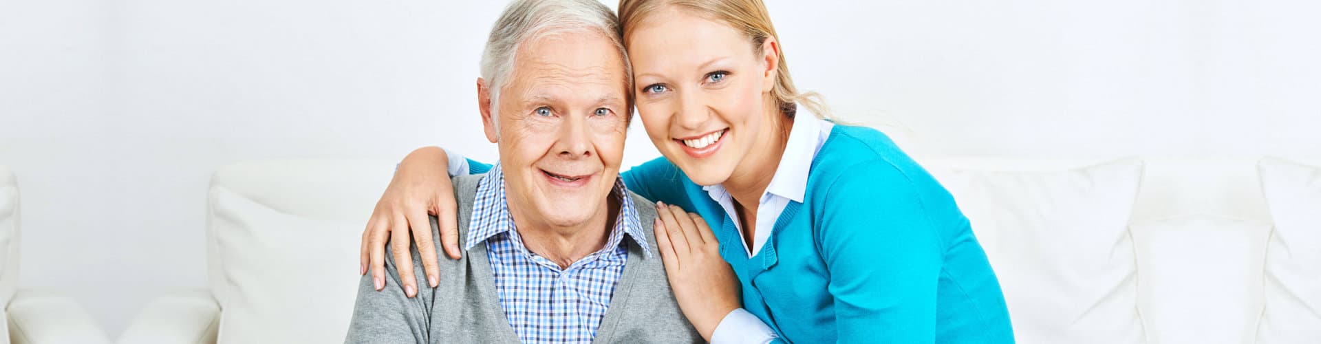 senior man and her daughter smiling